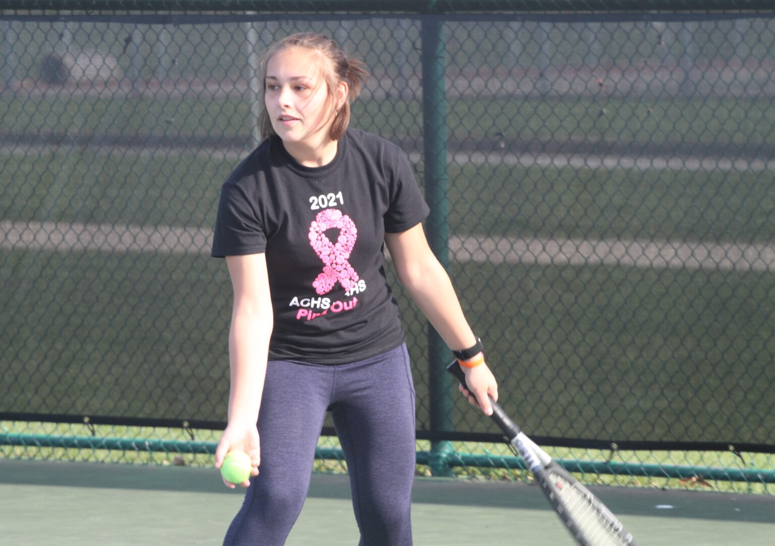 Centennial tennis teams sweep “Pink Out” event against rival Ankeny